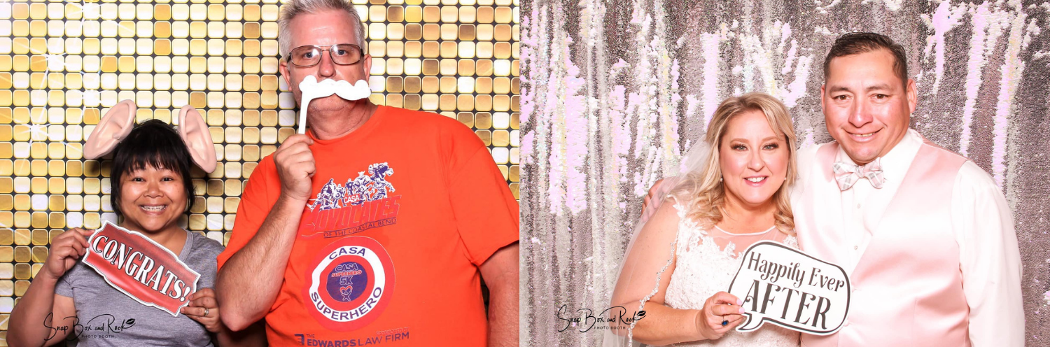 Couples smiling in a photo booth session 